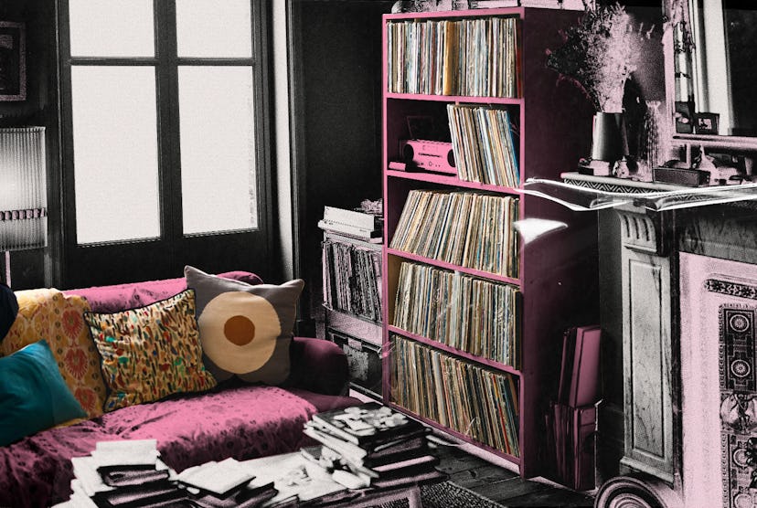 Sofa with colorful cushions, bookshelf and coffee table in livingroom