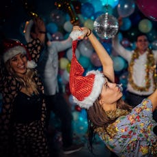 Group of friends having a new year party  and dancing