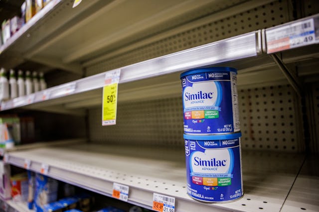 Shelves normally meant for baby formula sit nearly empty at a store in downtown Washington, DC, on M...