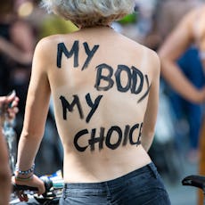 "My body my choice" written on person's back. Instagram and Facebook might finally free the nipple i...