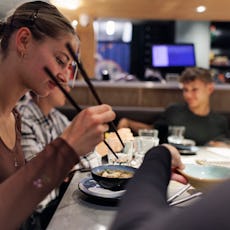 Mom brings her teenagers out to dinner for Valentine's Day instead of romantic partner.