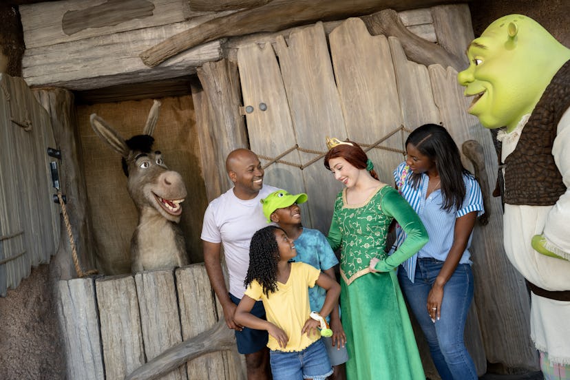 Guests at Universal Orlando's DreamWorks Land meet Shrek and Donkey.