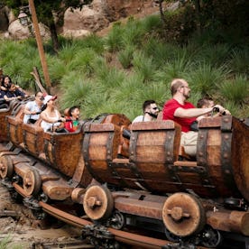 Guests on the Seven Dwarfs Mine Train at Disney World's Magic Kingdom on Saturday, June 3, 2023 in L...