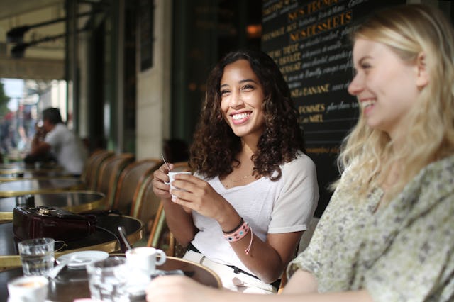 Women enjoy coffee in France.