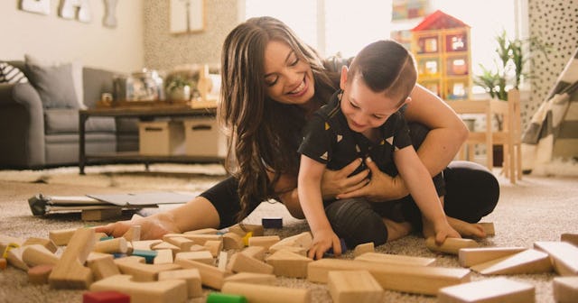 A stay-at-home mom playing with her son