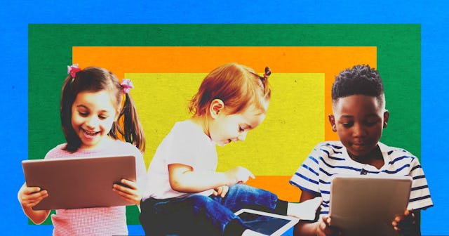 Three children in front of the colorful background holding their iPads and smiling.